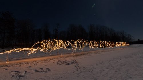Drink Hot Mulled Wine + Skate Under the Stars, Surrounded By 400 Tiki Torches
